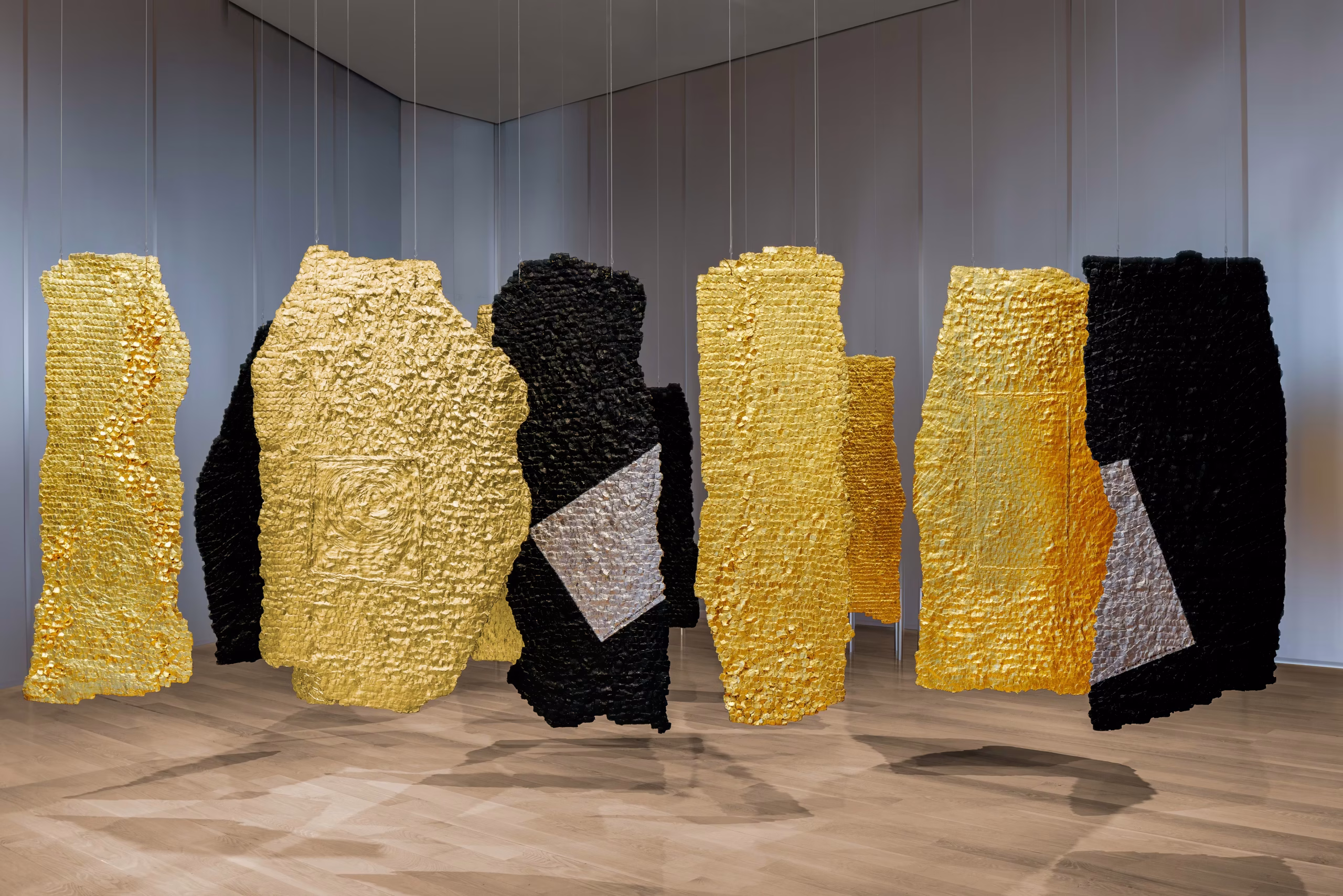 Olga de Amaral, Pueblo H, 2011. A landmark gold-leaf fibre composition that exemplifies her architectural approach to textile abstraction. Credit: Courtesy of Fundación Cartier and ICA Miami. Photo: ICA Miami.